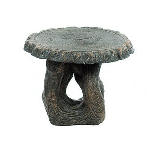 May include: A rustic-style, round, wooden table with a tree trunk base. The table top is a light brown color with a dark brown wood grain pattern. The base is a dark brown color with a rough, textured surface.