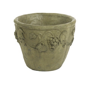 May include: A round, green, concrete planter with a grapevine design. The planter has a textured surface and a slightly flared lip.