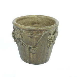 May include: A brown ceramic planter with a vine and grape design. The planter has a textured surface and a wide rim.