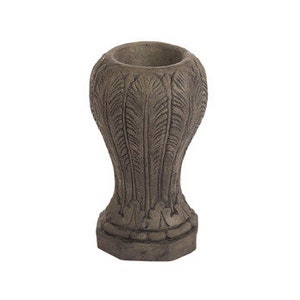 May include: A gray concrete planter with a decorative feather design. The planter has a round top and a hexagonal base.