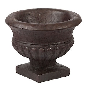 May include: A dark brown, decorative urn planter with a fluted design and a square base.