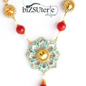 May include: A handmade necklace with a central floral pendant, featuring a large, faceted gold crystal. The pendant is surrounded by white, turquoise, and gold beads. Red beads and a teardrop-shaped red stone complete the design. The necklace has the text "bizSUterie design".