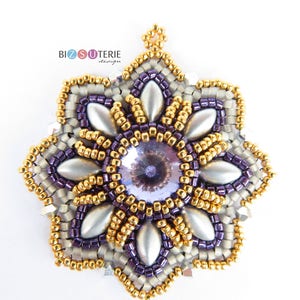 May include: A purple, gold and silver beaded flower pendant with a crystal centre. The pendant is made with seed beads and has a starburst design.