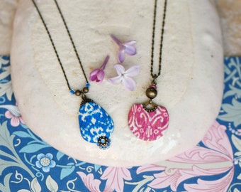 Brass necklace with blue or pink ikat pendant, 'Nilufar' collection