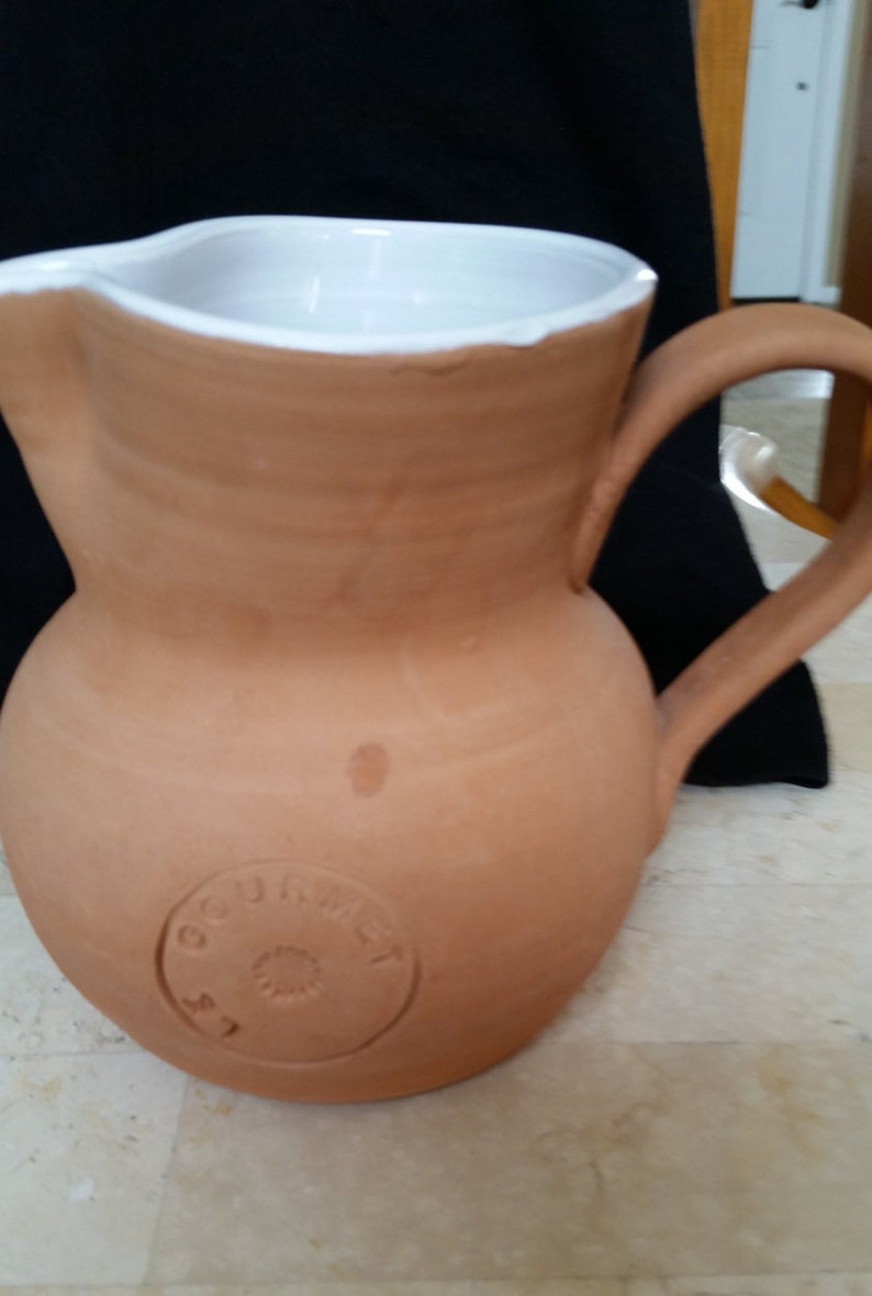 Tan Pottery Pitcher
