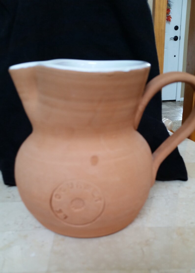 Tan Pottery Pitcher