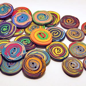 Buttons. Spiral buttons with random multi-coloured patterns. Unique decorative buttons for crafts and clothing. Sold individually.