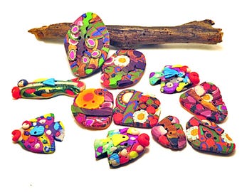 Botones de arcilla polimérica con diseño de peces tropicales y varios estampados (se venden por unidad)