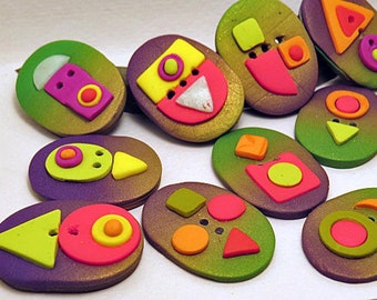 Buttons. Fun colourful oval buttons. Brightly patterned unique buttons. Decorative buttons for clothing and crafts. Sold individually.