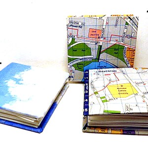 Blanko Bücher. Quadratische Explosionsbücher. Blankobücher mit Stadtplan von Sydney und blauem Himmel mit Covern. Lustige Blankobücher für besondere Anlässe.