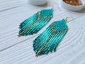 Turquoise beaded earrings - Clip on earrings or ear hooks - Long boho dangle earrings - Fringe seed bead earrings - Dangly earrings product logo