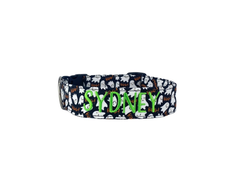 Get your pup ready for spooky season with our personalized Halloween dog collar! Featuring a fun ghost print with “Boo!” details, this collar brings festive charm to every walk. Customize it with your dog’s name in bright embroidery for a unique, eye-catching look. Handmade for comfort and durability, it’s perfect for trick-or-treat strolls or fall photos. Show off your dog’s playful spirit with this adorable Halloween-themed collar from Duke & Fox®!