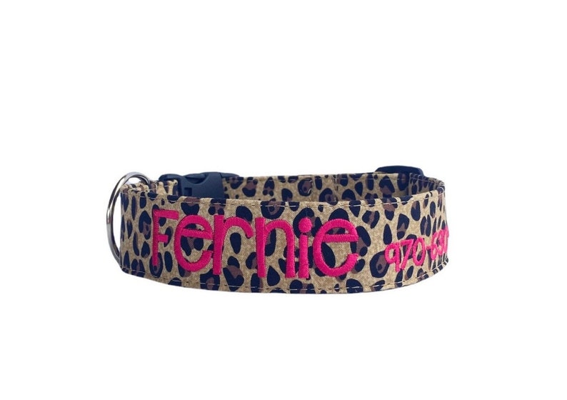 Show off your pup’s wild side with this personalized leopard print dog collar from Duke & Fox®. Handmade in Tennessee, this stylish collar features your dog’s name and contact info embroidered for a bold, custom look. Perfect for everyday wear or special outings, it combines fashion and function with durable materials and a comfortable fit—ideal for trendy dogs who love to stand out.