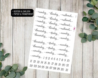 May include: A sheet of planner stickers with black script text. The stickers include days of the week in German, numbers 1-31, and the text "DEUTSCH & ENGLISCH - PAPIER & TRANSPARENT" in a black rectangle. The stickers are on a white background.