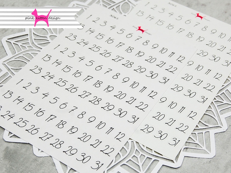May include: A sheet of white paper with black numbers 1 through 31 printed on it. The numbers are arranged in rows and columns, with each row containing the numbers 1 through 31. The numbers are printed in a handwritten font.