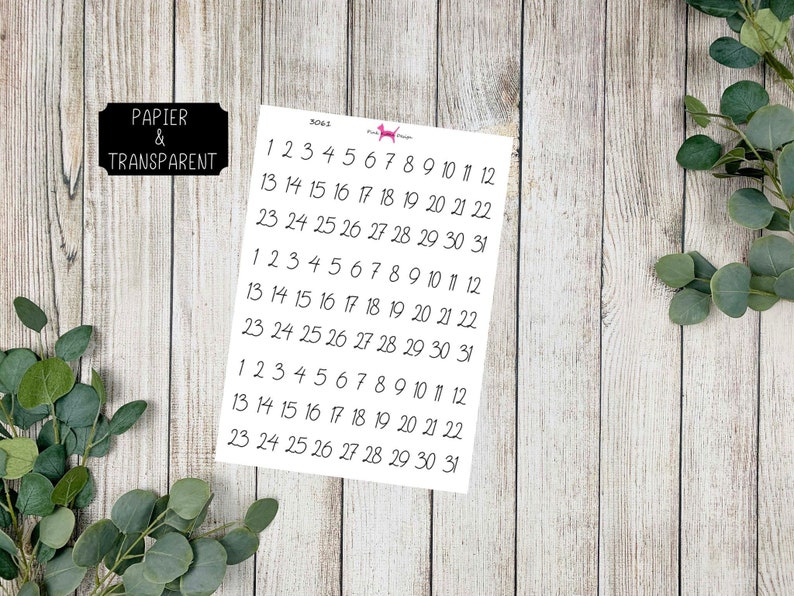 May include: A sheet of white paper with numbers 1 through 31 printed in black ink. The numbers are arranged in three rows of 11 numbers each. The paper is labeled "Papier & Transparent" in the top left corner.