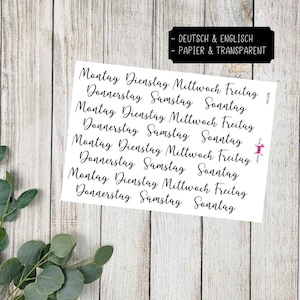May include: A sheet of white paper with the days of the week written in German and English. The text reads "Montag, Dienstag, Mittwoch, Freitag, Donnerstag, Samstag, Sonntag". The text is repeated multiple times on the sheet.