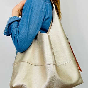 Large leather slouchy Champagne gold metallic hobo bag