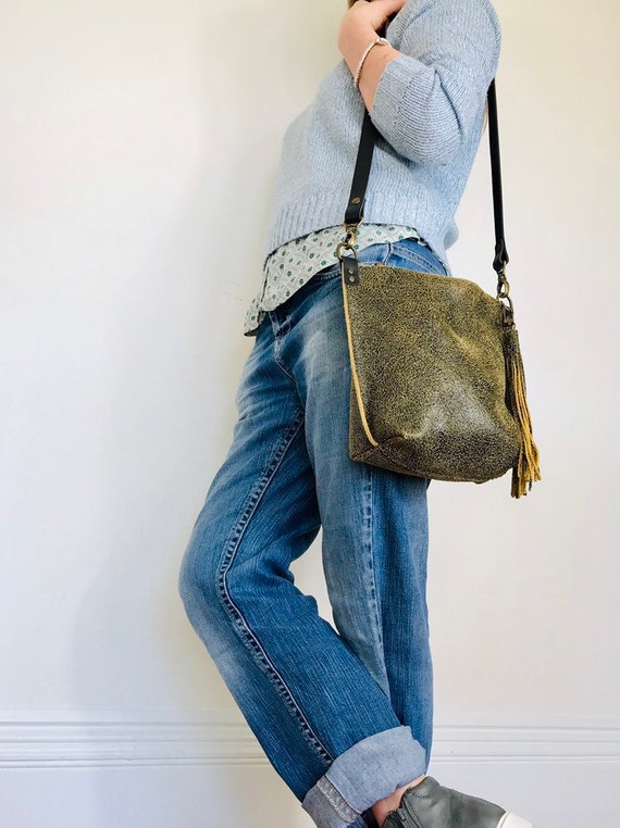 distressed leather crossbody bag