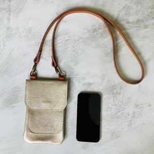 Champagne gold metallic leather smartphone bag with a crossbody strap