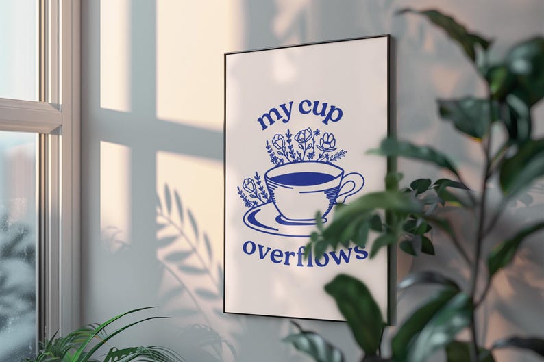 May include: A white poster with blue text and a blue illustration of a cup overflowing with flowers. The text reads "my cup overflows".
