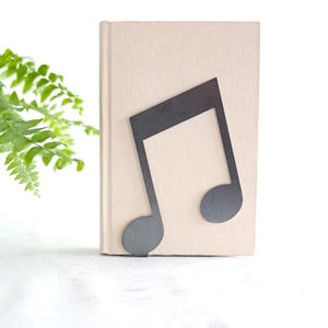 May include: A rustic wooden sign with the text "Welcome to our home" in a handwritten style. The sign is rectangular, with a distressed finish, and features a simple, inviting design. It's suitable for indoor or outdoor use.