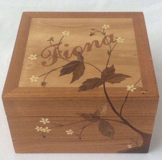 A handcrafted cherry wood marquetry keepsake box with personalized inlay — 180 favorites confirm this is the kind of heirloom craft you don't see on Amazon.