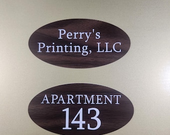 Apartment Number Door Sign - Laser Engraved Acrylic - Walnut woodgrain w/ White Copy Oval Shape Employees Only Way Finding Restroom
