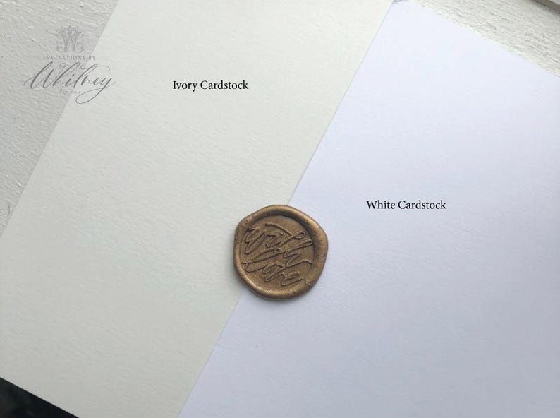 a penny sitting on top of a piece of paper