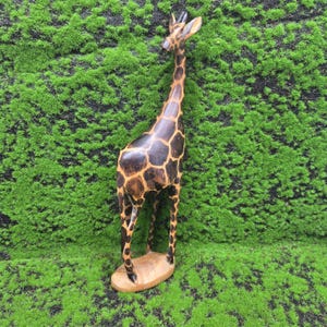 Wooden Hand Carved Giraffe Lovely example Of  A Giraffe Sculpture. 30cms