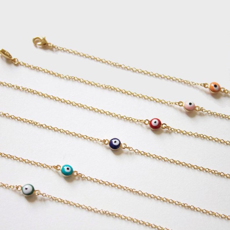 very fine chain golden and enamel eye bracelet
