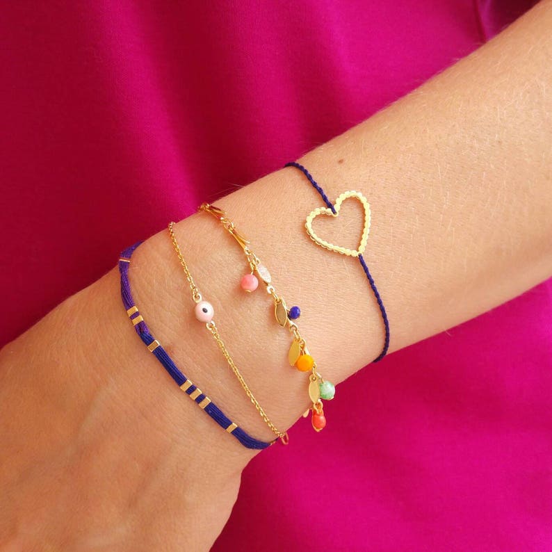 very fine chain golden and enamel eye bracelet