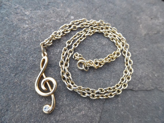 Treble clef necklace - image 1