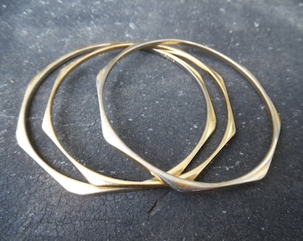 Three stacking Monet bracelets