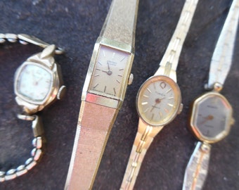 Four old watches