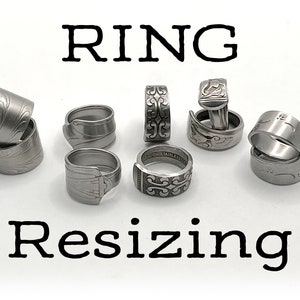May include: A collection of handcrafted metal rings, each with a unique design. The rings are made from silverware and feature various patterns and textures. The word "RING" and "Resizing" are printed in black.