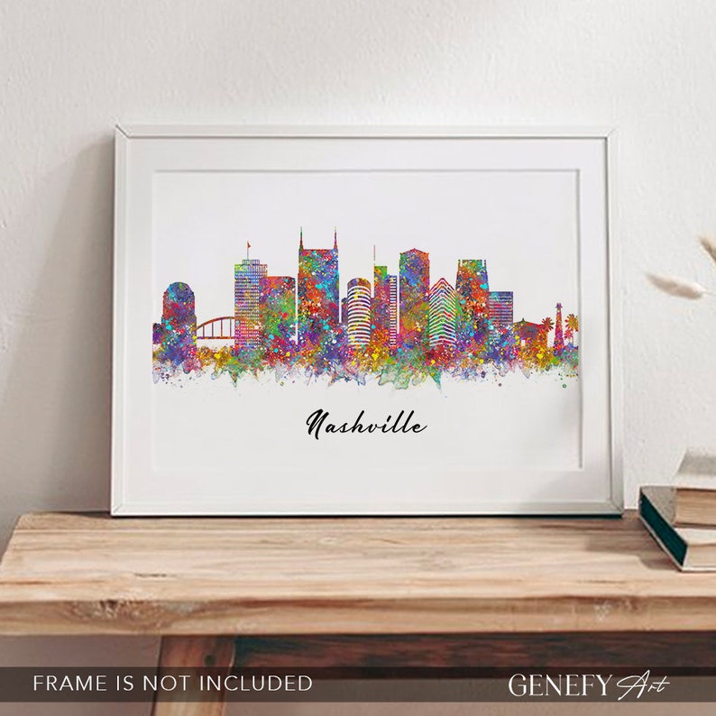 May include: A colorful watercolor painting of the Nashville skyline. The buildings are depicted in shades of blue, green, yellow, orange, and red. The city name, "Nashville", is written in black cursive at the bottom of the image.