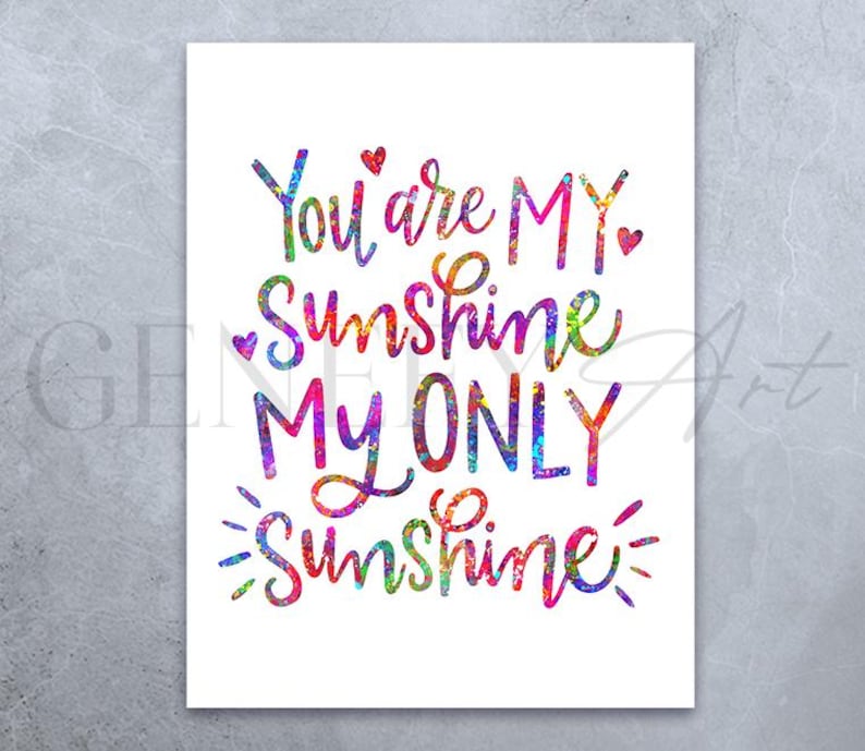 May include: A white print with the words "You are MY Sunshine, MY ONLY Sunshine" in colorful, watercolor-style lettering. Small red hearts accent the text. The print has a watercolor effect with a variety of colors.