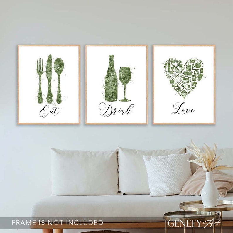 May include: Three green watercolor prints with white backgrounds. The first print features a fork, knife, and spoon with the word "Eat" below. The second print features a wine bottle and wine glass with the word "Drink" below. The third print features a heart made of kitchen icons with the word "Love" below.