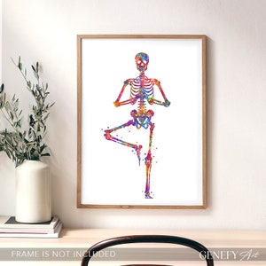 May include: A watercolor painting of a skeleton in a yoga pose, with a colorful, splatter-paint effect. The skeleton is in a tree pose, with one leg raised and the other leg bent. The skeleton's arms are raised in a prayer position.