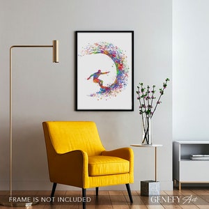 May include: A colourful watercolour painting of a surfer riding a wave. The painting is framed in black and is hanging on a white wall.
