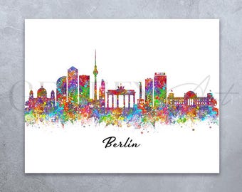 May include: A watercolor painting of the Berlin skyline, featuring iconic landmarks like the Brandenburg Gate and the Berlin TV Tower. The painting is done in a vibrant rainbow color palette, with splashes of color creating a dynamic and artistic effect. The word "Berlin" is written in black at the bottom of the painting.