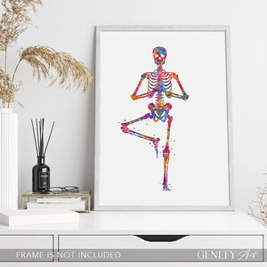 May include: A colorful watercolor painting of a skeleton doing a yoga pose. The skeleton is in a tree pose with its arms raised above its head. The painting is on a white background.
