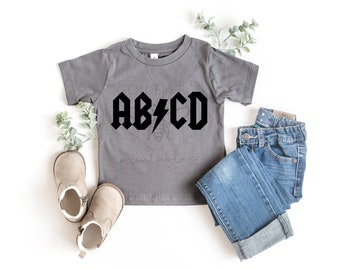 ABCD Rock SVG – Diseño de camiseta rockera vintage de los 80 (descarga digital)