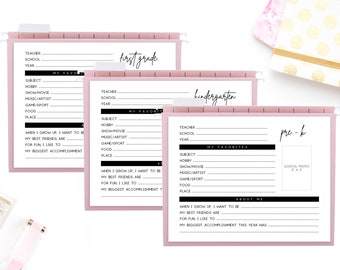May include: Three pink file folders with white labels. The labels have black text that reads "first grade", "kindergarten", and "pre-k". Each folder has a section for a student to fill out information about their school year, including their teacher, school, year, favorite subject, hobby, show/movie, music/artist, game/sport, food, place, and more.