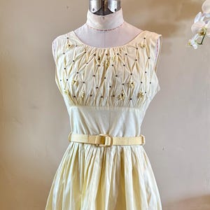 Pale Yellow Cotton 1950s Shirtwaist Dress Pleats with tiny studs Sleeveless