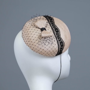 Beige hatinator with little bow