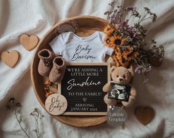 May include: A wooden tray with a white onesie that says "Baby Davison" and a letter board that says "We're adding a little more sunshine to the family! Arriving January 2025". There are also brown baby booties, a teddy bear holding an ultrasound picture, and a wooden sign that says "Oh Baby!"
