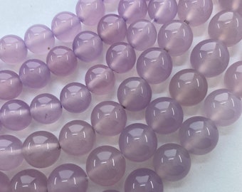 Purple (Grape) Chalcedony gemstone beads. 15" strands of transparent light purple beads.  Light purple Jade.