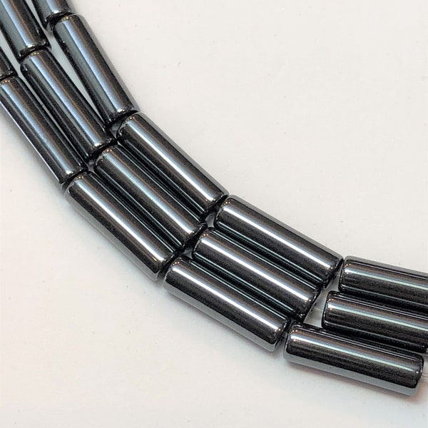 Hematite Gemstone Beads. 4x13mm tube shaped beads on 16 inch strand. Full strand of AAA Grade beads, roughly 30 beads per strand.